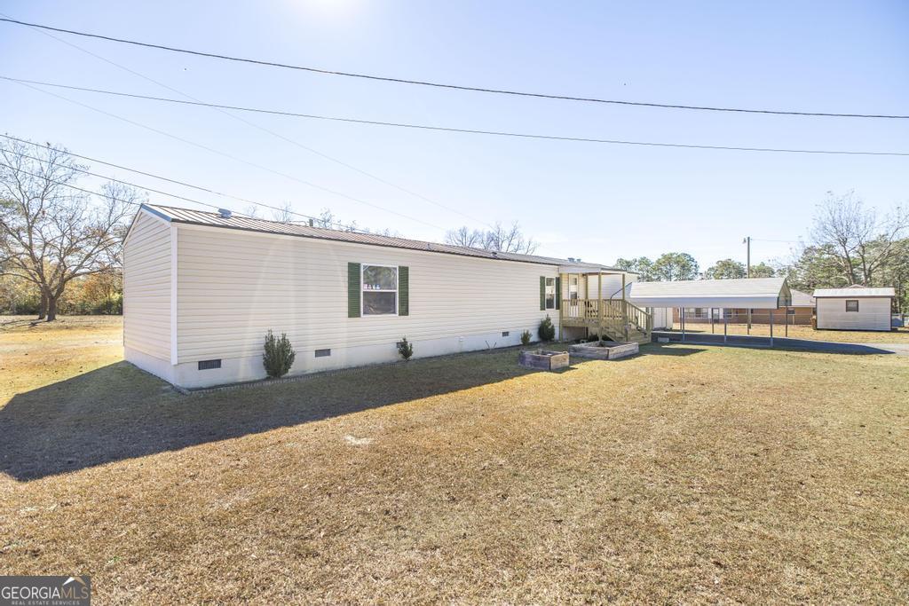 172 Old Eastman Road Cochran, GA 31014 - Photo 43 of 60 a house view with a outdoor space