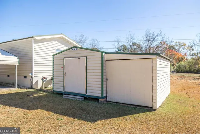 a bathroom with a sink a toilet and a bathtub