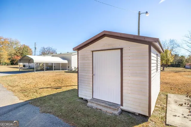 a bathroom with a bathtub a sink a vanity and a mirror