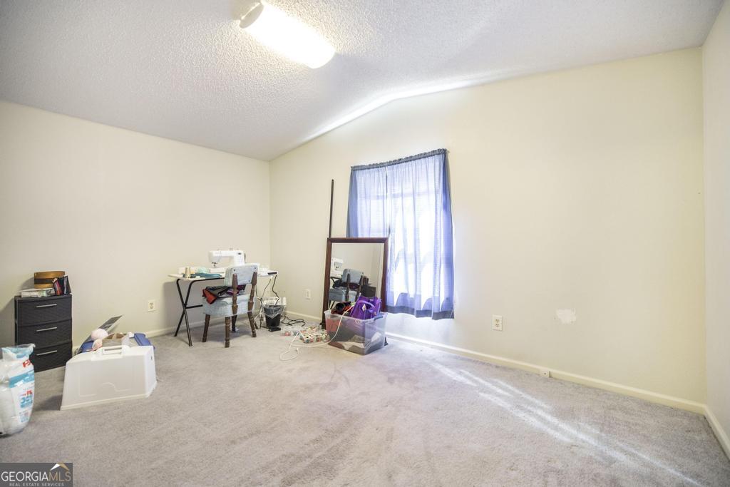 172 Old Eastman Road Cochran, GA 31014 - Photo 52 of 60 a living room with furniture and a large window