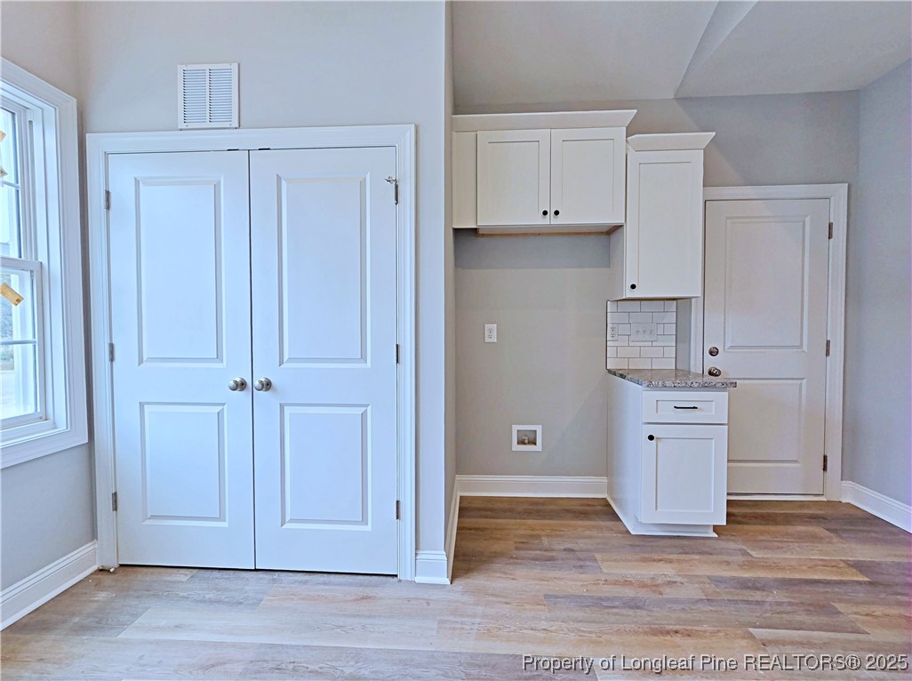 940 Kensington Park Road Fayetteville, NC 28311 - Photo 13 of 41 a view of kitchen with white cabinets