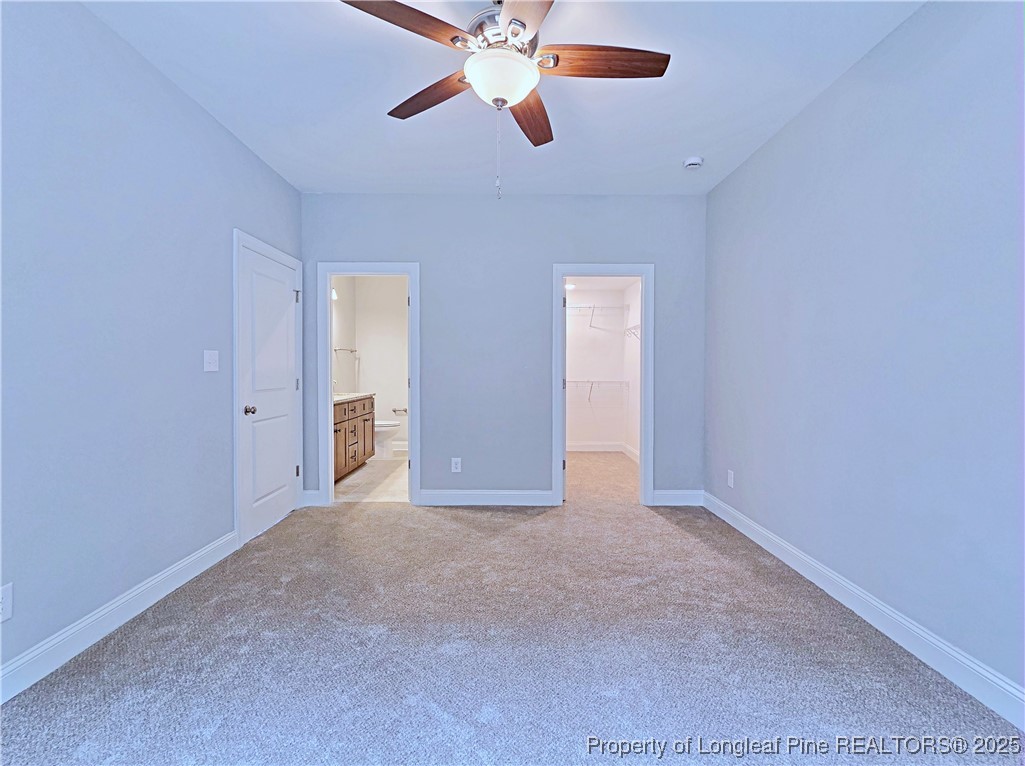 940 Kensington Park Road Fayetteville, NC 28311 - Photo 15 of 38 a view of an empty room and chandelier fan