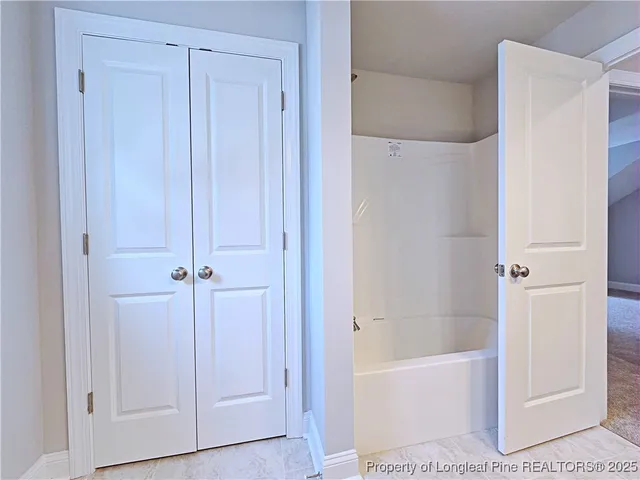 a bathroom with a bathtub