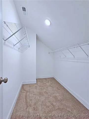 a view of a room with racks on the wall