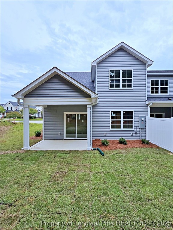 940 Kensington Park Road Fayetteville, NC 28311 - Photo 37 of 38 a front view of a house with a yard and garage
