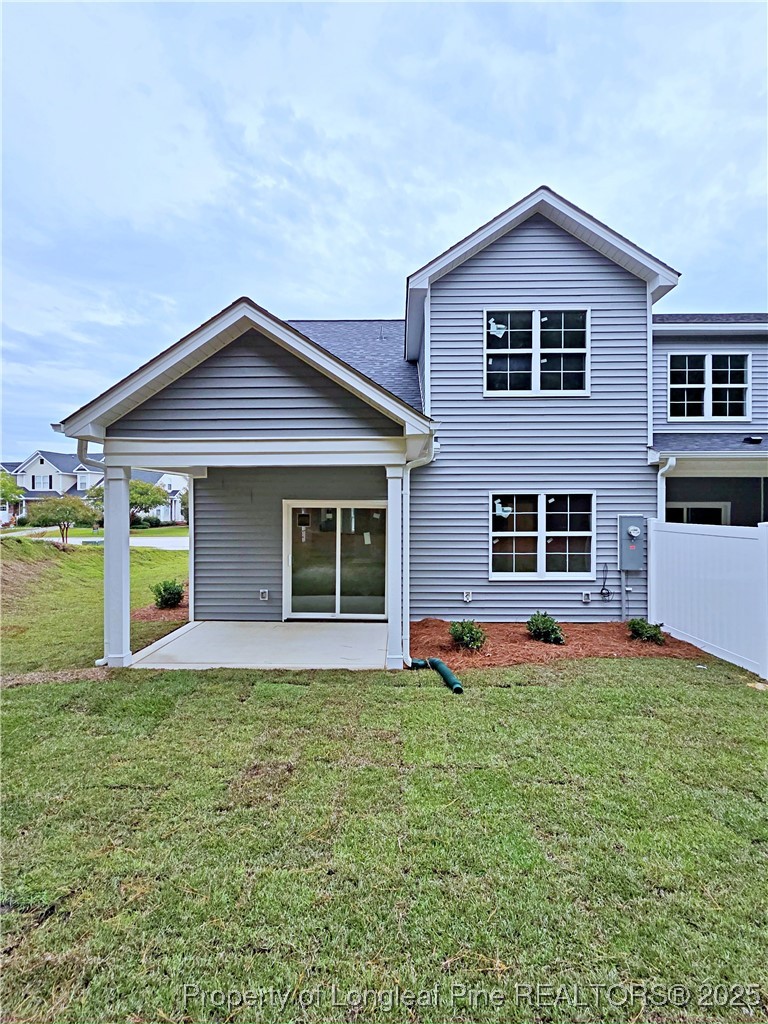 940 Kensington Park Road Fayetteville, NC 28311 - Photo 40 of 41 a front view of a house with a yard and garage