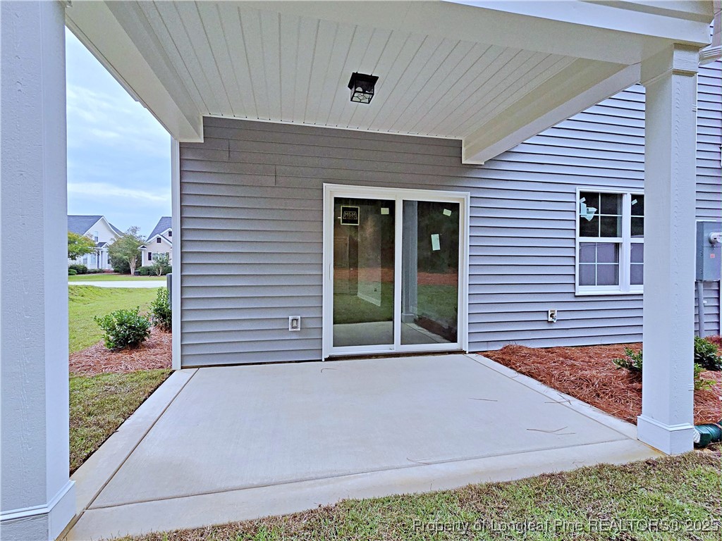 940 Kensington Park Road Fayetteville, NC 28311 - Photo 41 of 41 a front view of a house with garden
