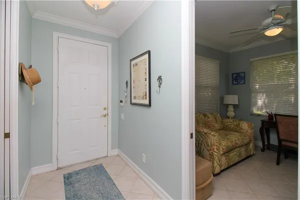 a living room with furniture and a gate