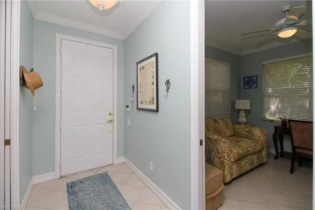 a living room with furniture and a gate