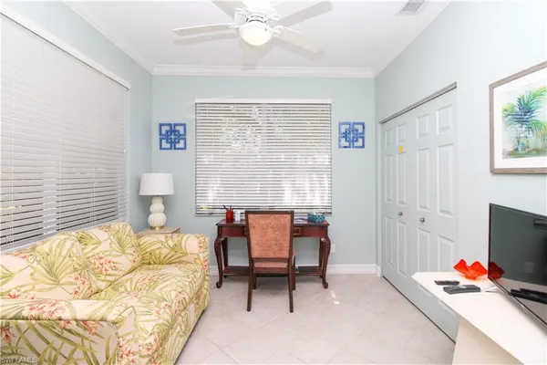 a bedroom with furniture and a bed