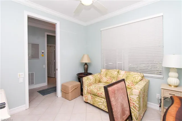 a bedroom with a bed and a table