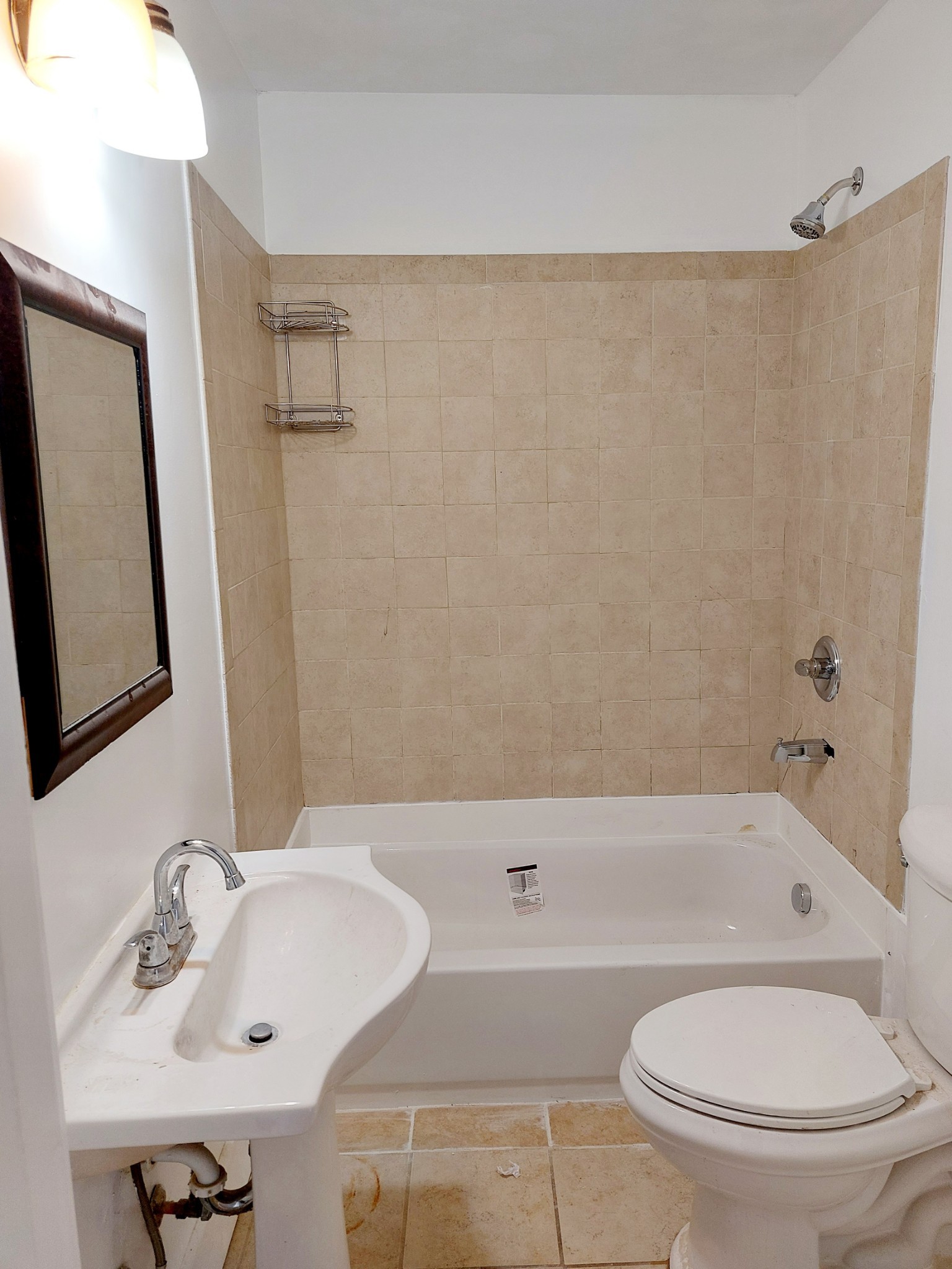 324 Harrington Avenue Madison, TN 37115 - Photo 11 of 12 a bathroom with a sink toilet and shower