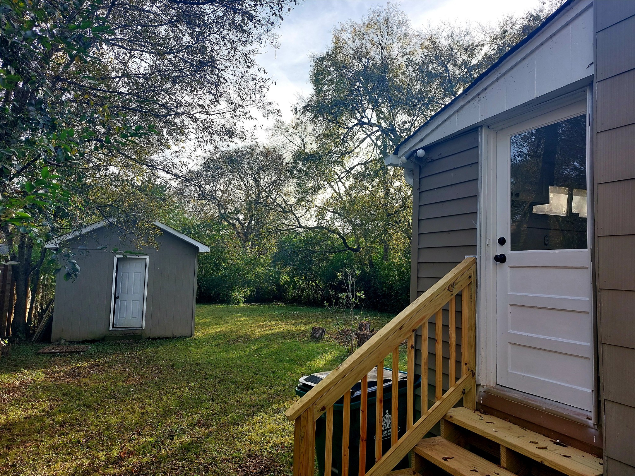 324 Harrington Avenue Madison, TN 37115 - Photo 2 of 12 a view of a house with a yard and wooden fence