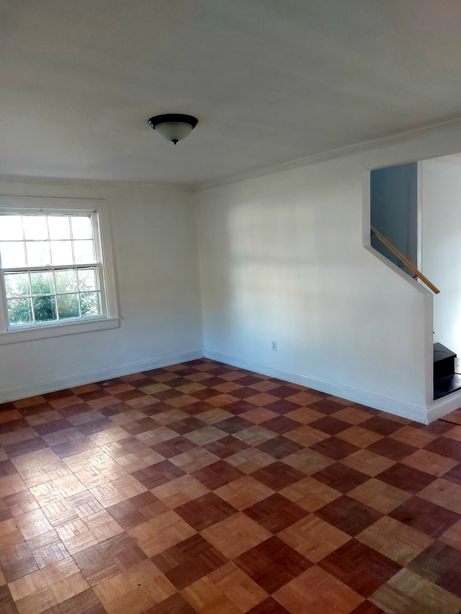 324 Harrington Avenue Madison, TN 37115 - Photo 10 of 12 an empty room with wooden floor and windows