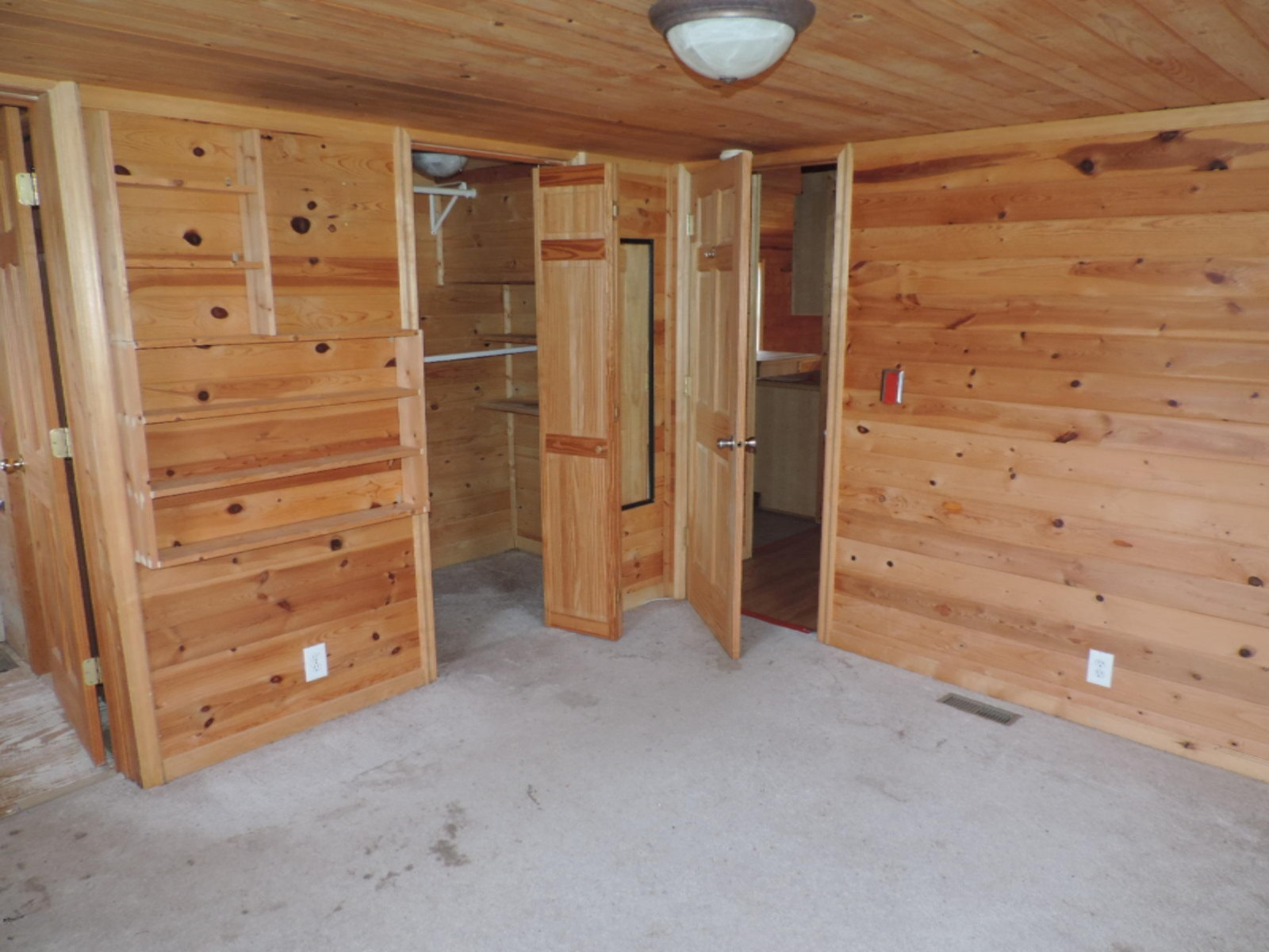 7780 Hagar Shore Road Coloma, MI 49038 - Photo 22 of 31 263-395817 MASTER BEDROOM WITH BUILT-IN