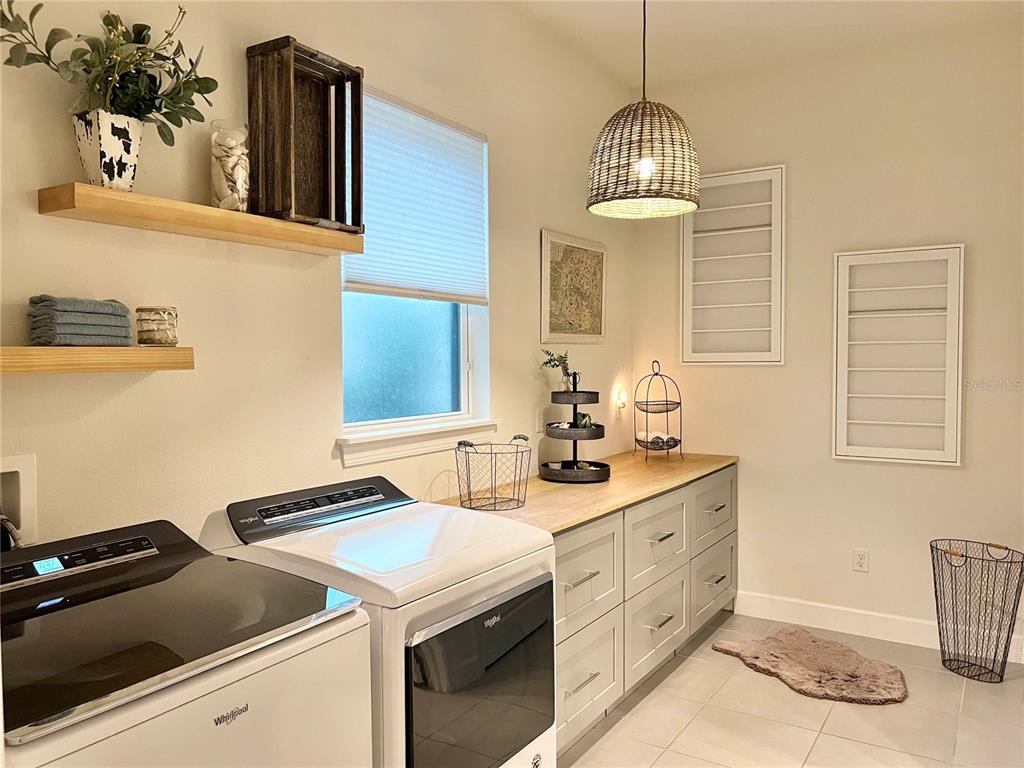 2337 Clemblue Road Clermont, FL 34715 - Photo 24 of 33 a kitchen with a stove and a sink