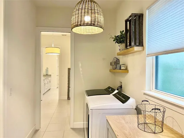 a bathroom with a sink a mirror and shower
