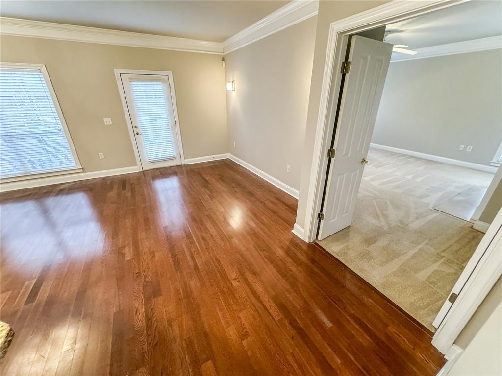 2000 Sterling Court Roswell, GA 30075 - Photo 15 of 45 an empty room with wooden floor and entrance