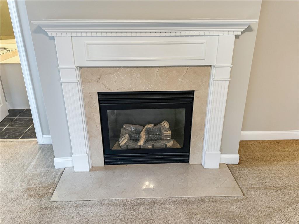 2000 Sterling Court Roswell, GA 30075 - Photo 20 of 45 a living room with a fireplace