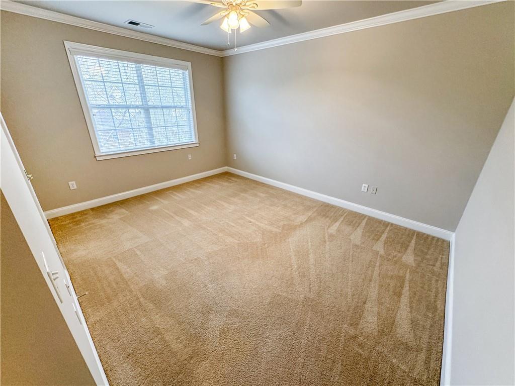 2000 Sterling Court Roswell, GA 30075 - Photo 32 of 45 an empty room with windows and entrance