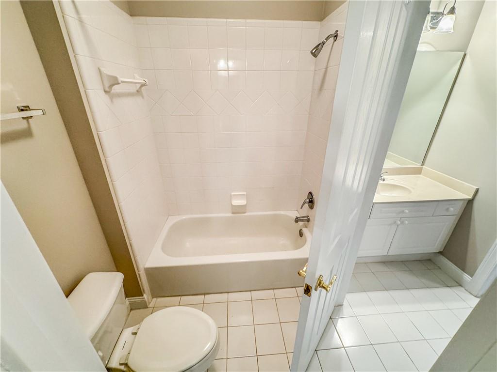 2000 Sterling Court Roswell, GA 30075 - Photo 36 of 45 a bathroom with a sink and a tub