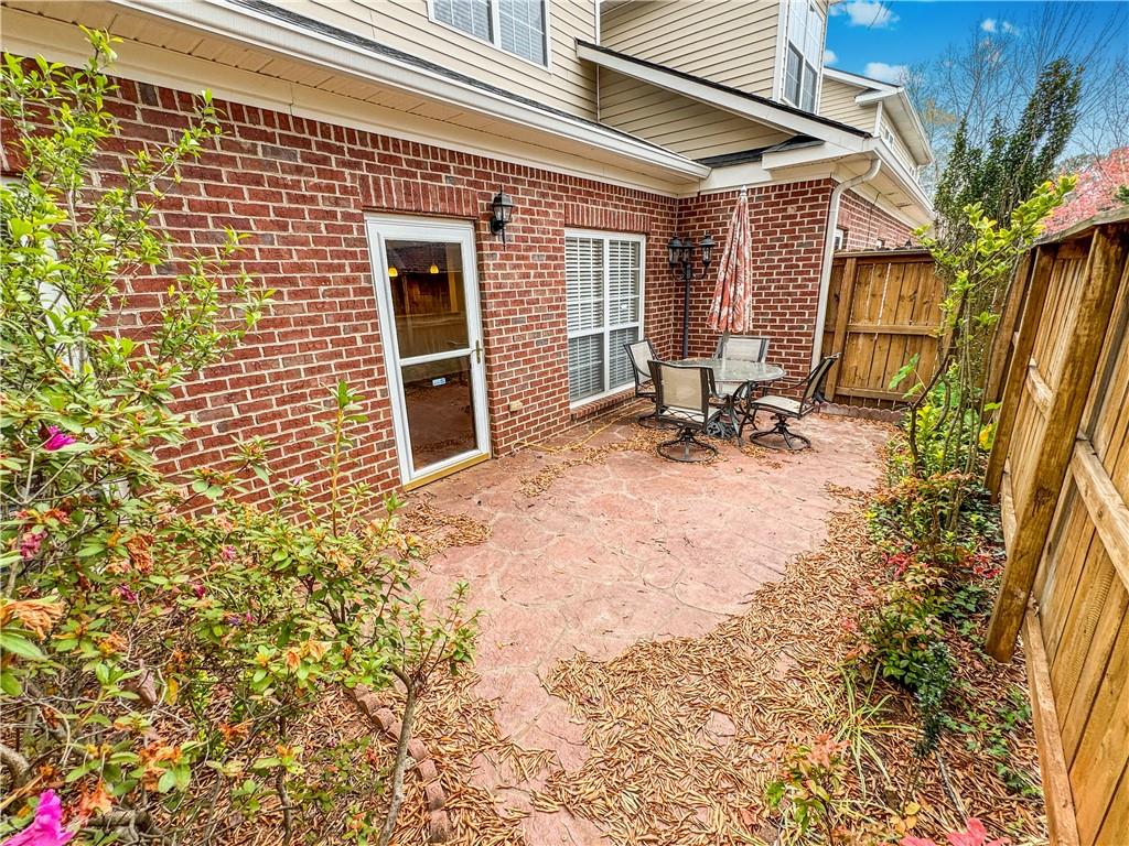 2000 Sterling Court Roswell, GA 30075 - Photo 43 of 45 a view of a house with backyard and sitting area
