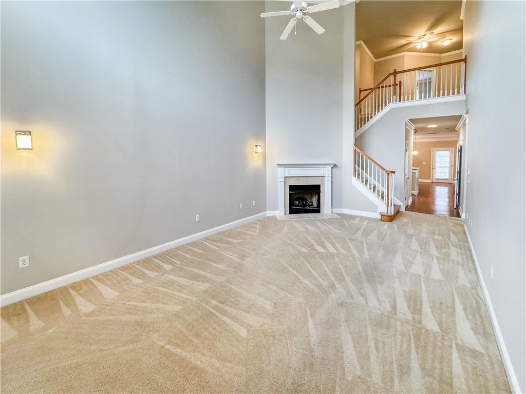 2000 Sterling Court Roswell, GA 30075 - Photo 6 of 45 a view of empty room with fireplace and entryway