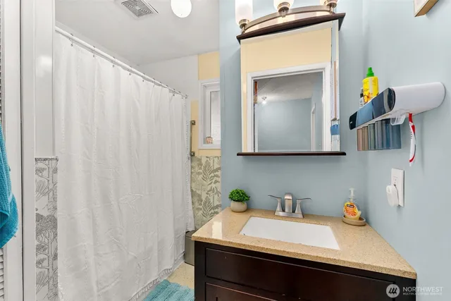 a room with a sink and a cabinets
