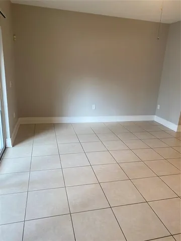 a view of a room with wooden floor and closet