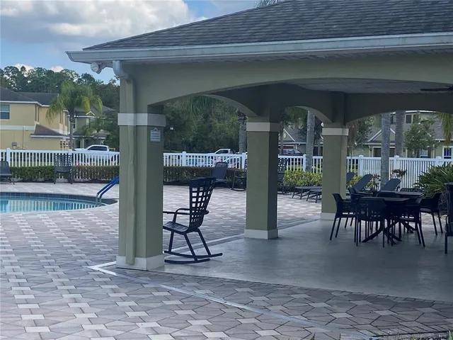 a view of swimming pool with a yard