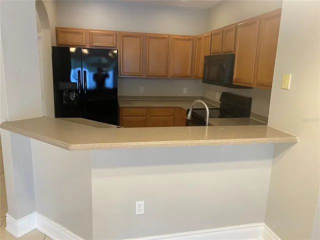 a view of a livingroom with a furniture