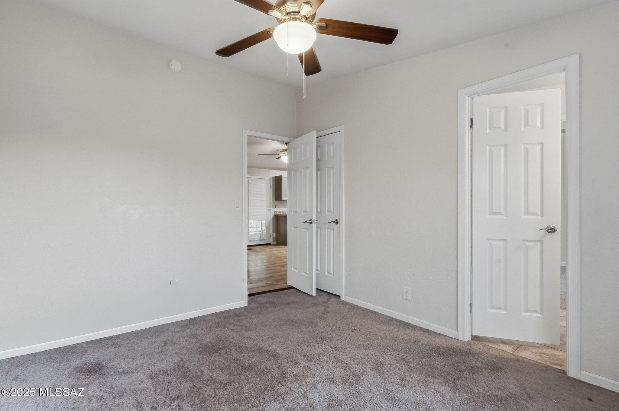 9740 North Running Back Way Marana, AZ 85653 - Photo 21 of 34 3rd bedroom looking into Jack n Jill bathroom