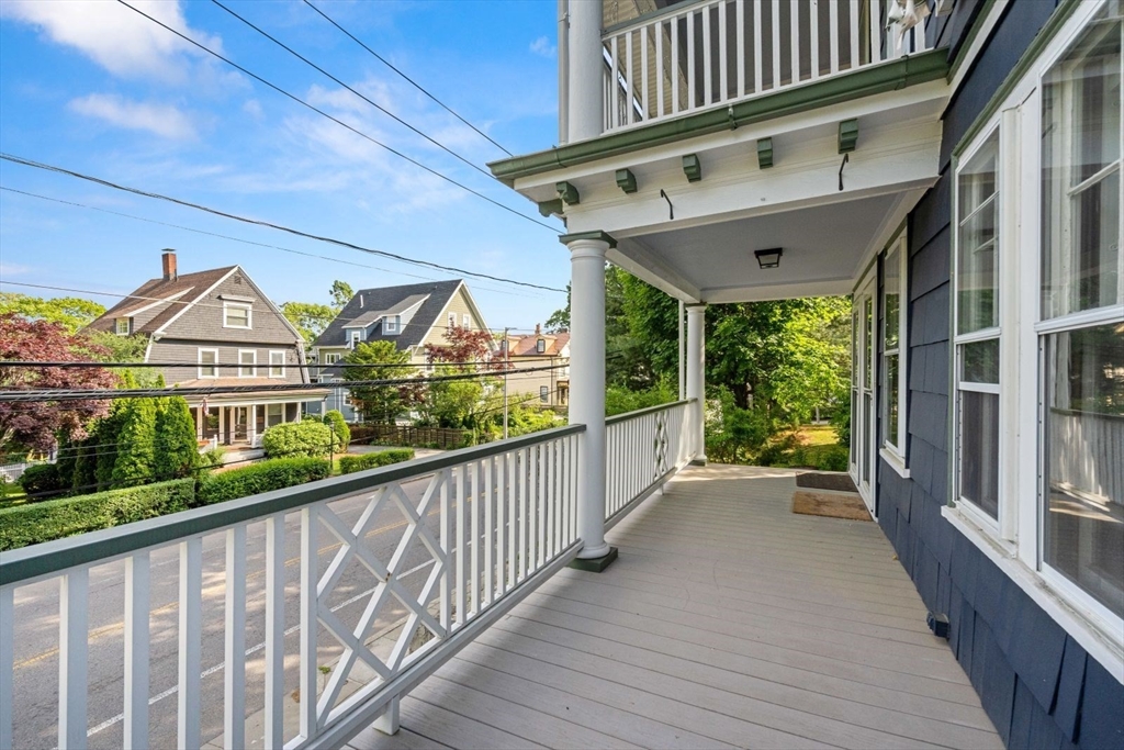 1045 Adams Street, Unit 1 Boston, MA 02124 - Photo 22 of 30 a view of a street from a balcony
