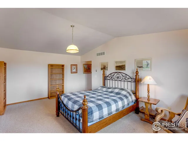 a bathroom with a toilet a sink and a mirror