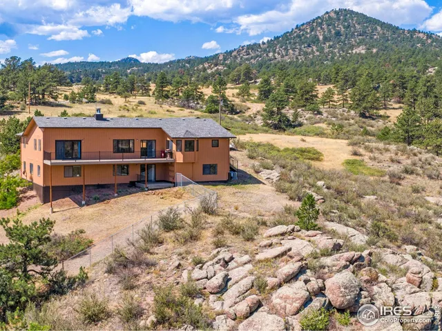 a view of a house with a terrace yard