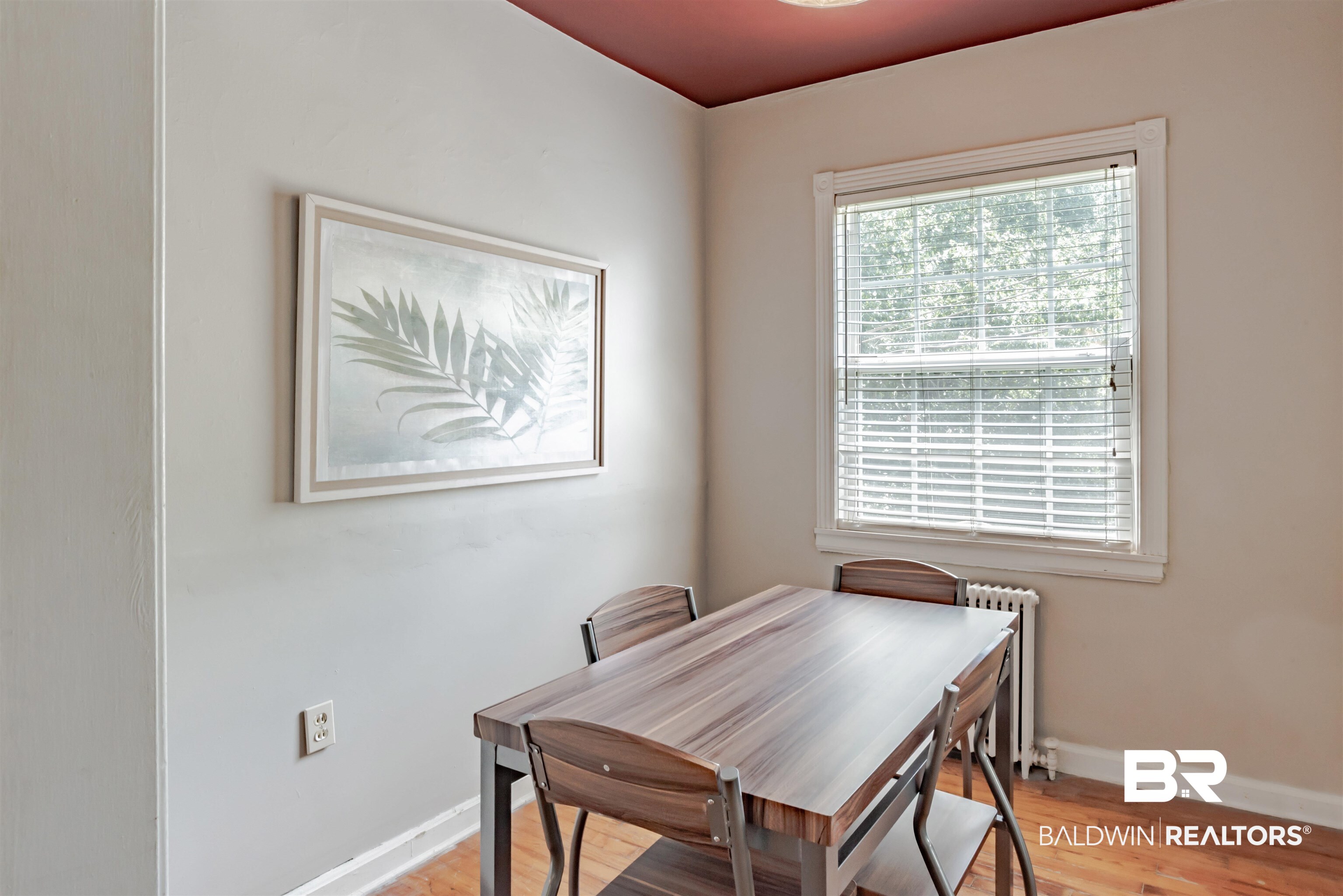 214 Upham Street, Unit 7C Mobile, AL 36607 - Photo 7 of 32 Dining area with radiator heating unit and light wood-type flooring