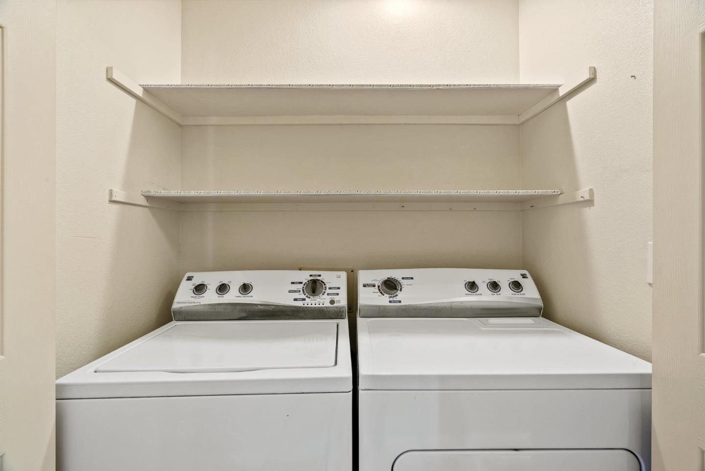16950 Sugar Pine Drive Morgan Hill, CA 95037 - Photo 15 of 48 a close up view of washer and dryer