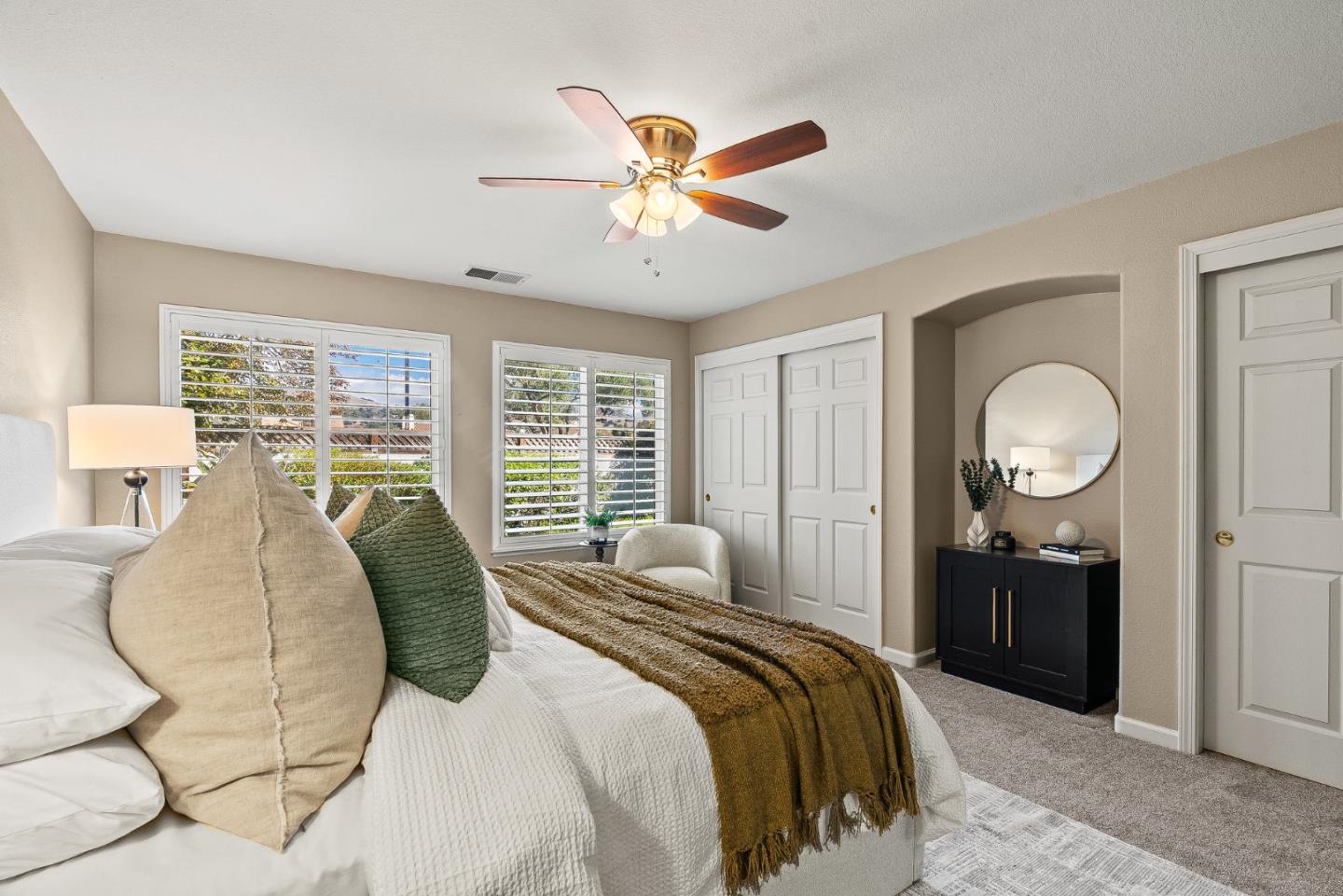 16950 Sugar Pine Drive Morgan Hill, CA 95037 - Photo 23 of 48 a bedroom with a large bed and a chandelier