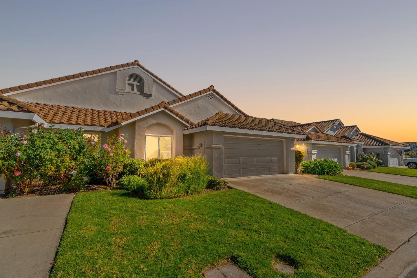 16950 Sugar Pine Drive Morgan Hill, CA 95037 - Photo 35 of 48 a front view of a house with a yard and garage
