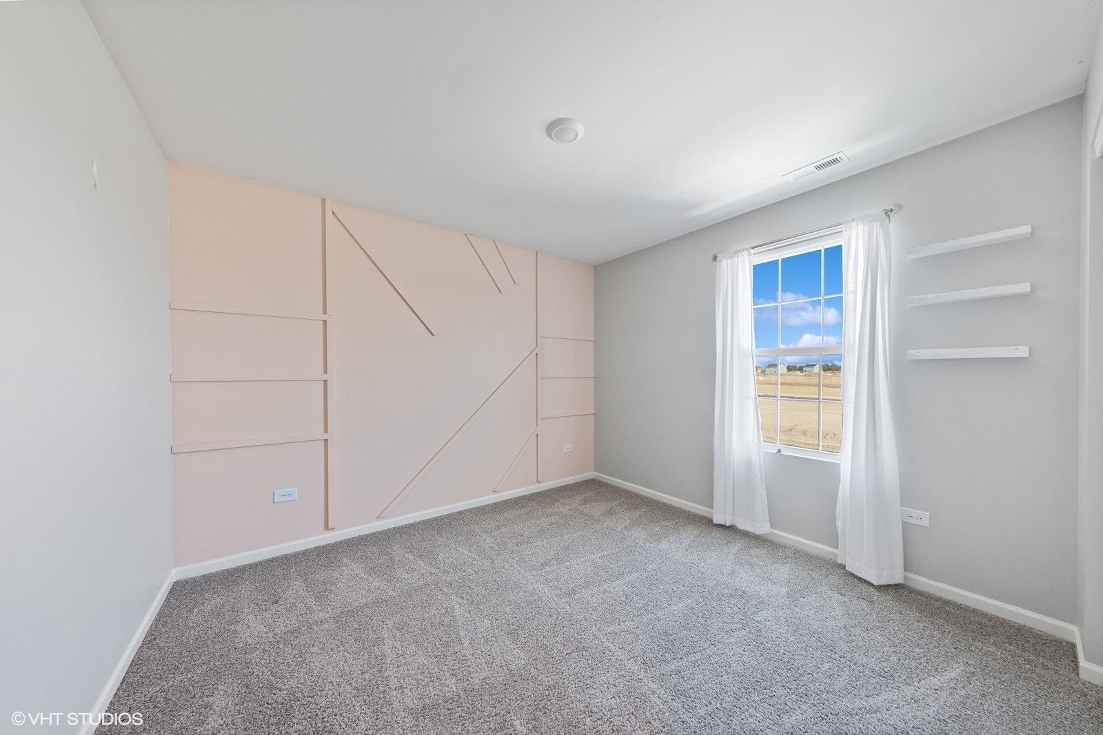 1234 Violet Ct. Joliet, IL 60431 - Photo 16 of 23 a view of an empty room with closet and a window