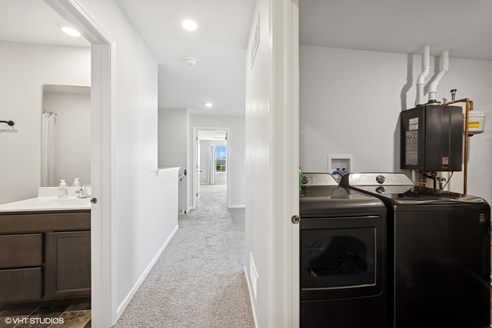1234 Violet Ct. Joliet, IL 60431 - Photo 18 of 23 a kitchen with a sink and refrigerator