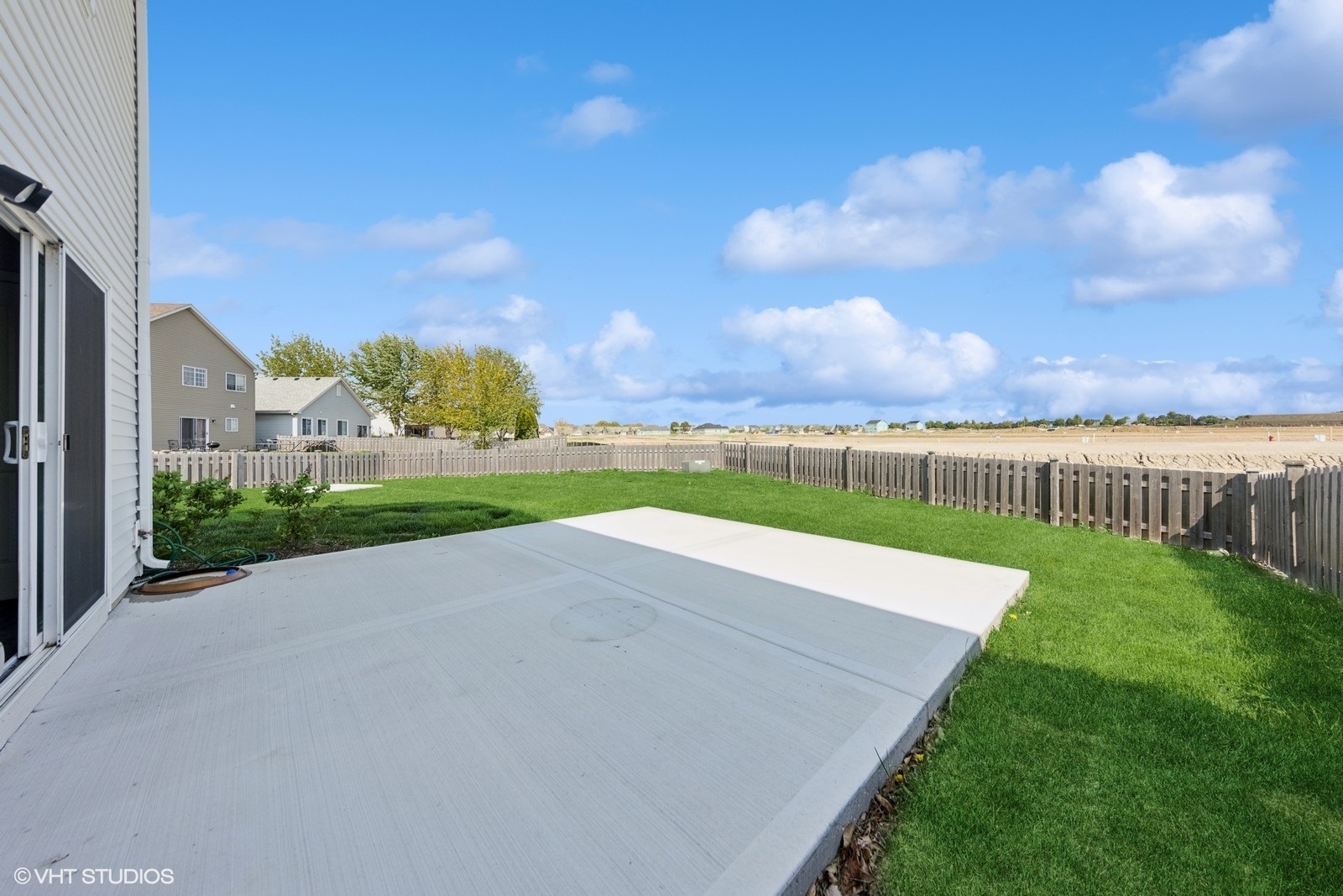 1234 Violet Ct. Joliet, IL 60431 - Photo 19 of 23 a view of a yard with an ocean view