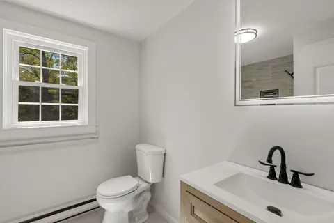 a bathroom with a sink and a toilet
