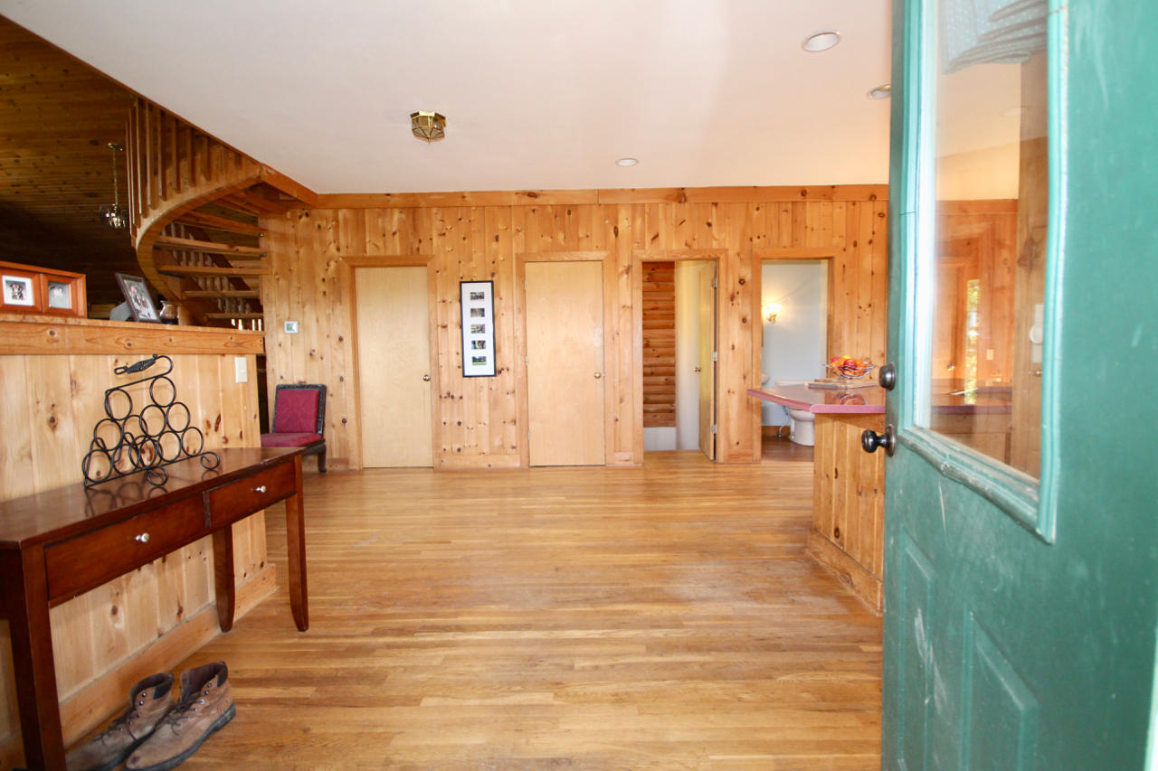 4860 Indian Valley Road Riner, VA 24149 - Photo 61 of 96 a view of an entryway with a floor to ceiling window