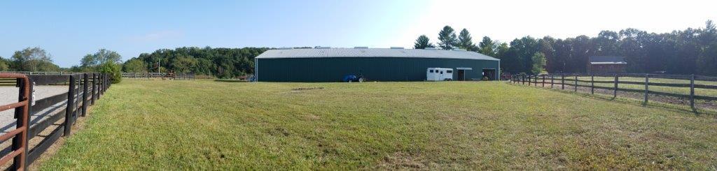 4860 Indian Valley Road Riner, VA 24149 - Photo 85 of 96 a front view of house with yard and trees in the background