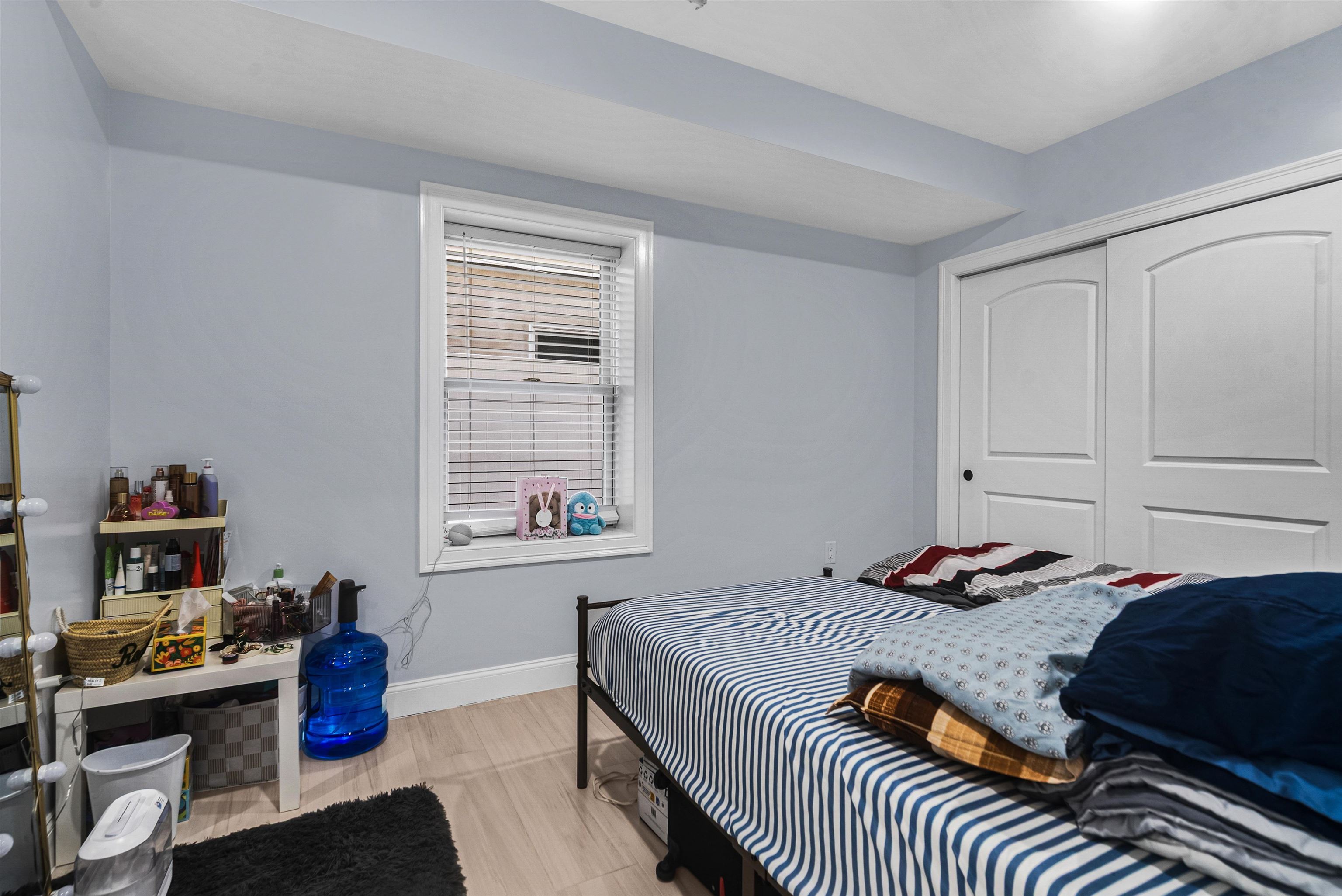 11 South 7th Street Harrison, NJ 07029 - Photo 22 of 29 a bedroom that has a bed and a window