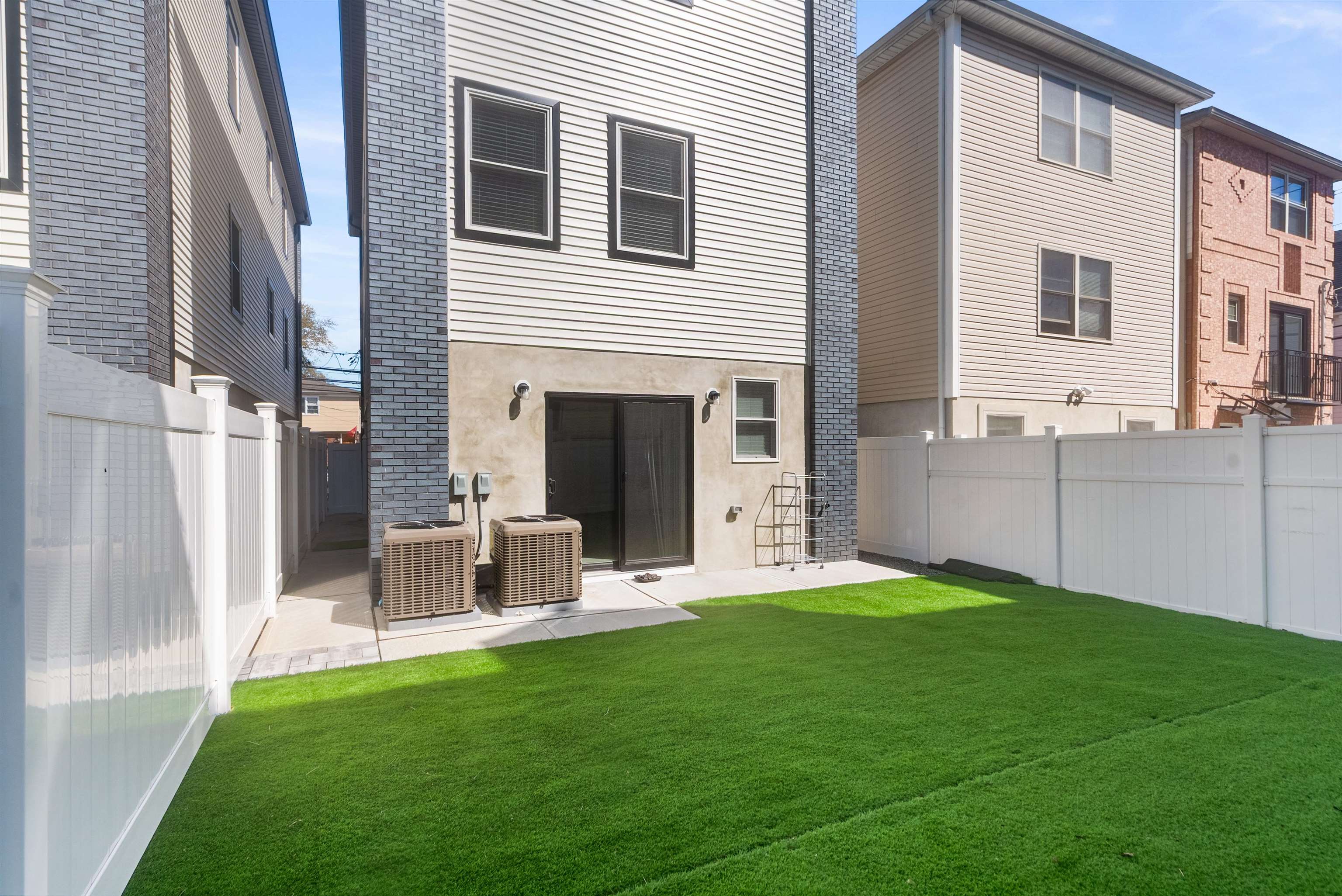 11 South 7th Street Harrison, NJ 07029 - Photo 25 of 29 a view of a patio with a yard table and chairs
