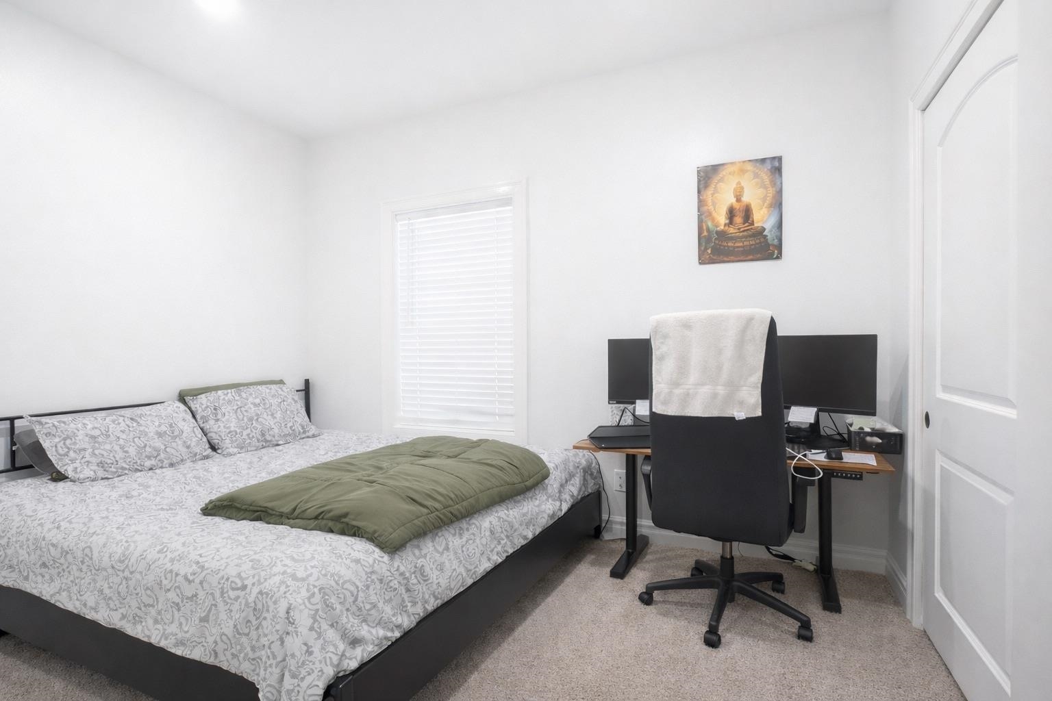 11 South 7th Street Harrison, NJ 07029 - Photo 9 of 29 a bedroom with a bed and a desk