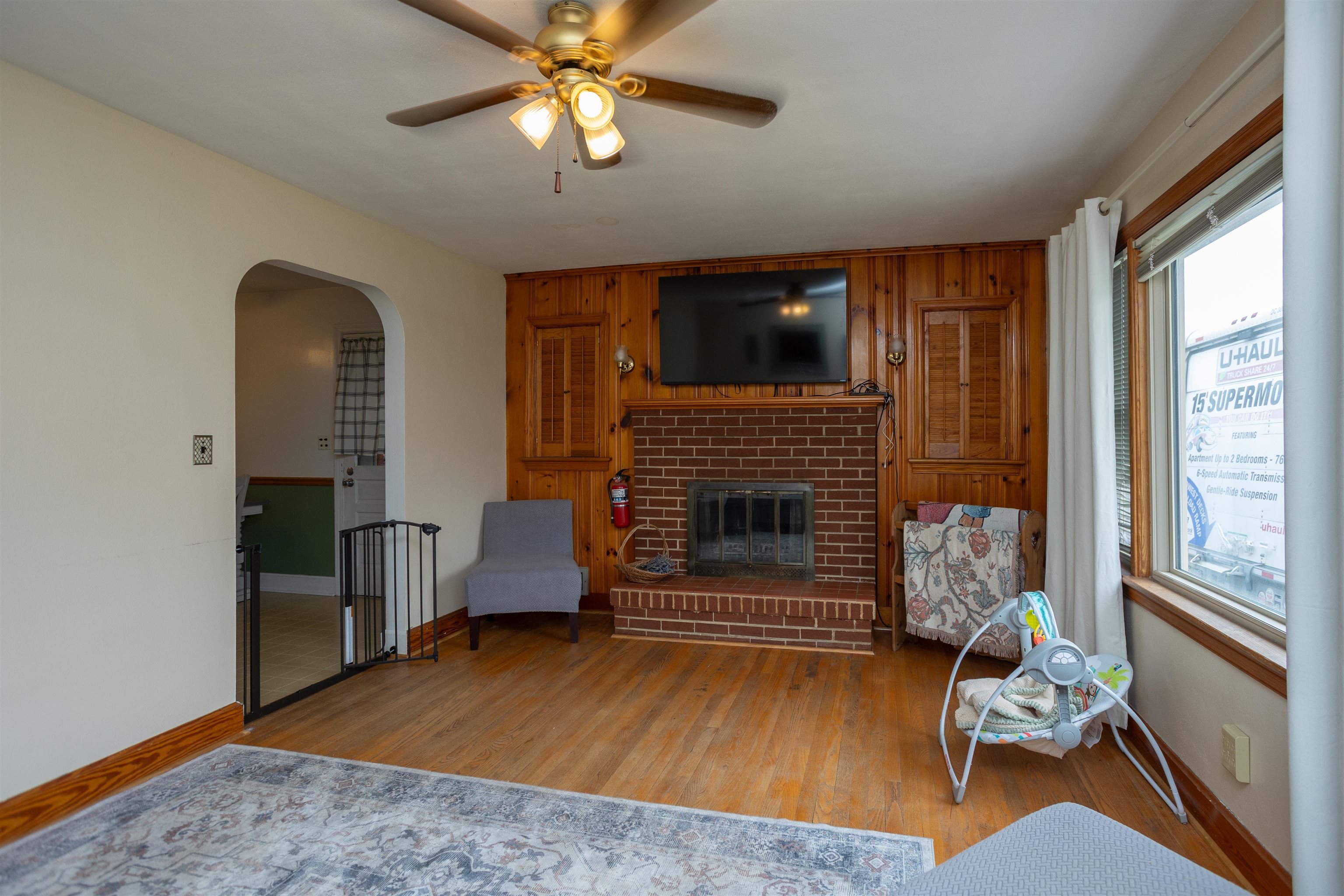 211 George Street Staunton, VA 24401 - Photo 2 of 37 a living room with furniture and a fireplace