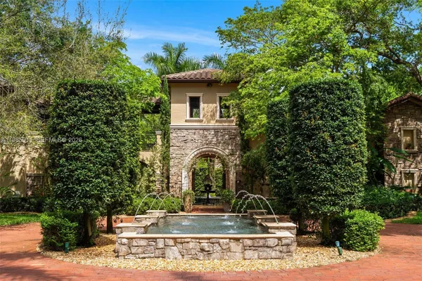 a view of house with sink and garden